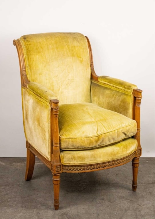 FRENCH CARVED ARMCHAIR: French carved armchair. Note: Each lot in this auction was stored in an active industrial warehouse. Accordingly, lots may exhibit dust and/or surface residue and may benefit from cleaning. Approximat