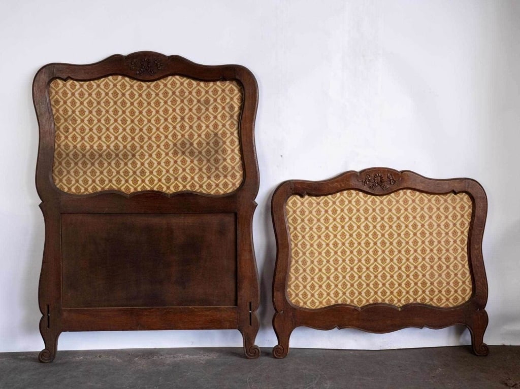 FRENCH STYLE TWIN BED WITH UPHOLSTERED BOARDS: French style twin bed with upholstered boards. Note: Each lot in this auction was stored in an active industrial warehouse. Accordingly, lots may exhibit dust and/or surface residue and may benefit fr