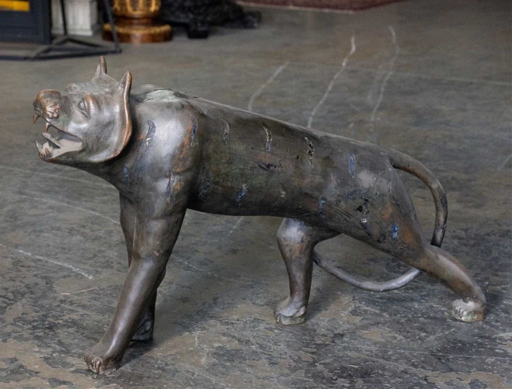 THAI BRONZE & GLASS INLAID TIGER SCULPTURE: Thai bronze & glass inlaid tiger sculpture Thai, late 19th - early 20th century. Bronze and glass inlaid tiger sculpture. Note: Each lot in this auction was stored in an active industrial warehouse. A
