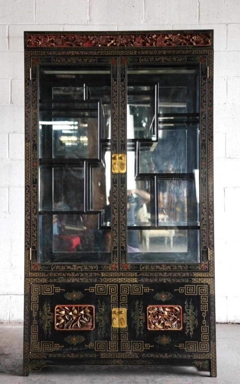 CHINESE BLACK LACQUER CARVED VITRINE: Chinese black lacquer carved vitrine. Note: Each lot in this auction was stored in an active industrial warehouse. Accordingly, lots may exhibit dust and/or surface residue and may benefit from cleani
