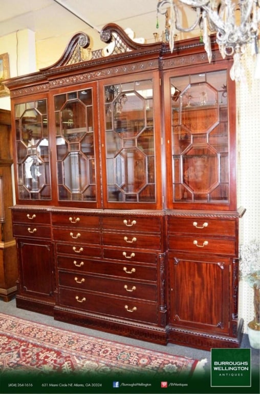 ENGLISH STYLE MONUMENTAL MAHOGANY BREAKFRONT SECRETAIRE: English style monumental mahogany breakfront secretaire. Note: Each lot in this auction was stored in an active industrial warehouse. Accordingly, lots may exhibit dust and/or surface residue and may 