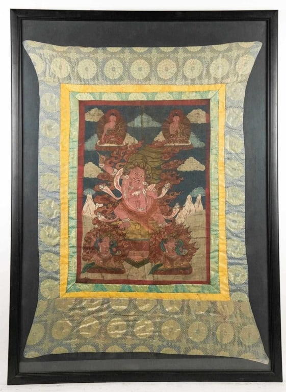 ANTIQUE TIBETAN THANGKA IN FRAME: Antique Tibetan thangka in frame. Note: Each lot in this auction was stored in an active industrial warehouse. Accordingly, lots may exhibit dust and/or surface residue and may benefit from cleaning.