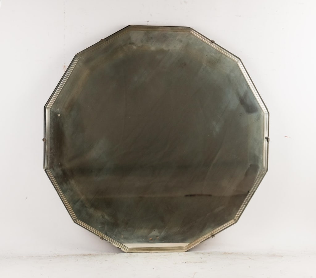 MIDCENTURY DODECAGON WALL MIRROR: Midcentury dodecagon wall mirror. Note: Each lot in this auction was stored in an active industrial warehouse. Accordingly, lots may exhibit dust and/or surface residue and may benefit from cleaning.