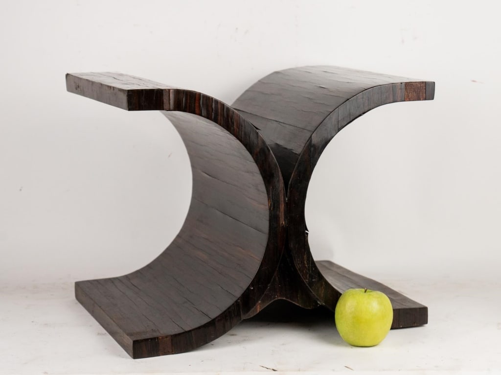 ZEBRAWOOD VENEER X FORM TABLE BASE: Zebrawood veneer x form table base. Note: Each lot in this auction was stored in an active industrial warehouse. Accordingly, lots may exhibit dust and/or surface residue and may benefit from cleaning