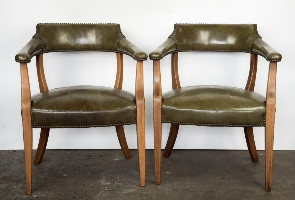 ENGLISH PAIR OF NAILHEAD TRIM BARREL CHAIRS: Pair of English nail head trim barrel chairs 20th c. Note: Each lot in this auction was stored in an active industrial warehouse. Accordingly, lots may exhibit dust and/or surface residue and may bene