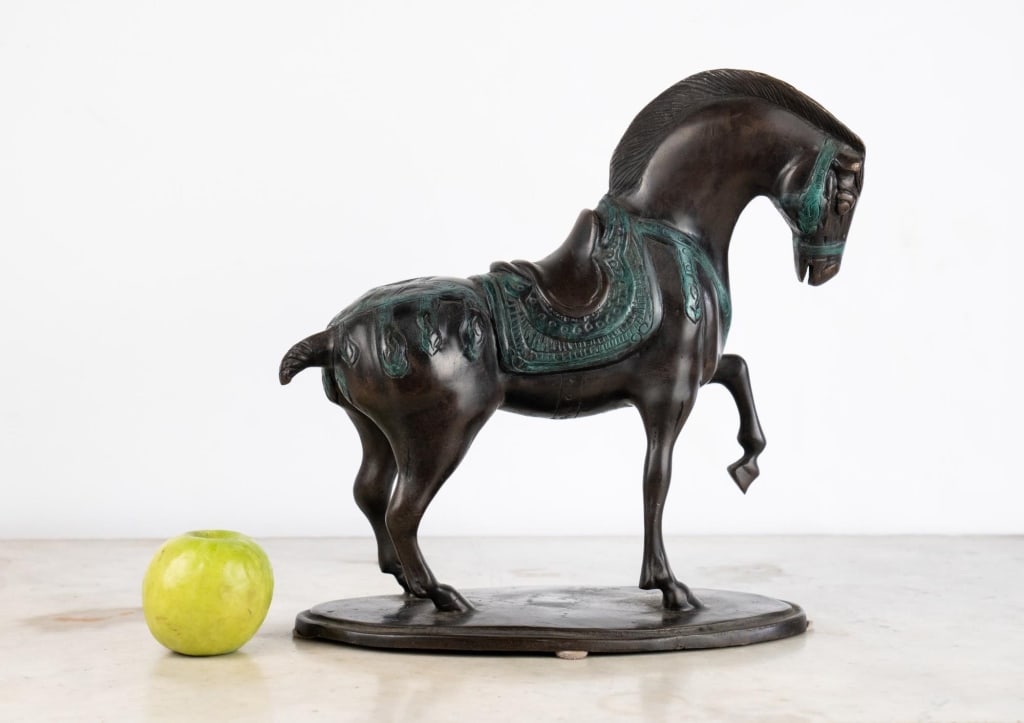 CHINESE TANG-STYLE PATINATED BRONZE PRANCING HORSE: Prancing horse bronze with dark brown patina and verdigris highlights to trappings, on integral oval base; incised signature including "Javier" and numbered 7/15 to base; likely late 20th / early 21st