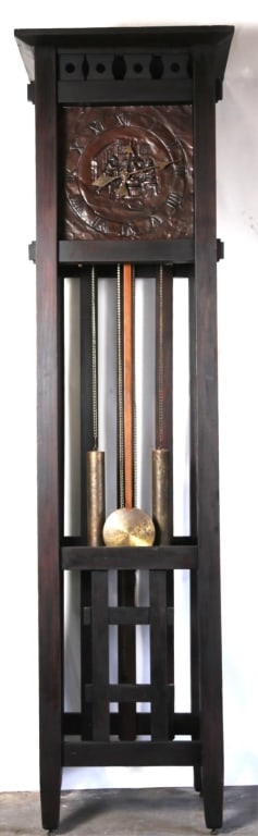 ARTS & CRAFT COPPER RELIEF GRANDFATHER CLOCK: Arts & craft copper relief grandfather clock in oak. Note: Each lot in this auction was stored in an active industrial warehouse. Accordingly, lots may exhibit dust and/or surface residue and may bene
