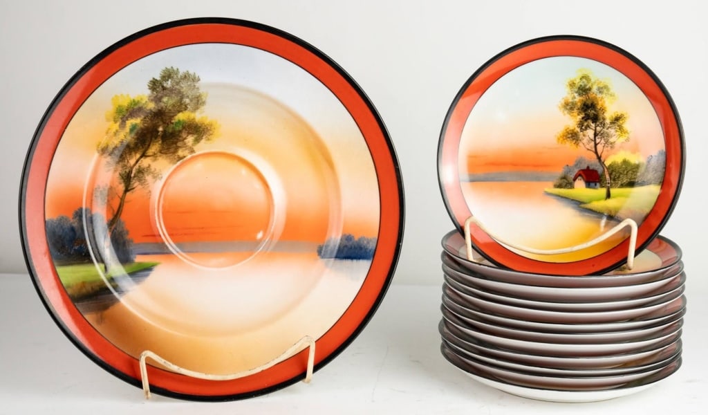 NORITAKE 13PC MID CENTURY CHINA GROUP: Noritake 13pc mid century china group 1 large plate, 12 side plates. Note: Each lot in this auction was stored in an active industrial warehouse. Accordingly, lots may exhibit dust and/or surface resi