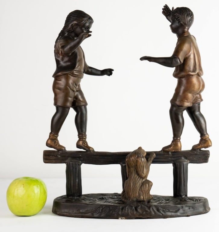 TWO CHILDREN AND A DOG, BRONZE PATINA SCULPTURE: Two children and a dog, bronze patina sculpture. Note: Each lot in this auction was stored in an active industrial warehouse. Accordingly, lots may exhibit dust and/or surface residue and may benefit 