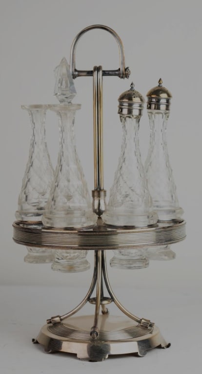 GORHAM SILVERPLATE CRUET CUT GLASS BOTTLE SET: Gorham silverplate cruet cut glass bottle set. Note: Each lot in this auction was stored in an active industrial warehouse. Accordingly, lots may exhibit dust and/or surface residue and may benefit fr