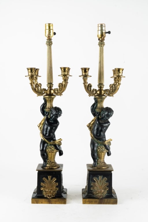FRENCH CHERUB LAMPS: Pair of French cherub lamps. Note: Each lot in this auction was stored in an active industrial warehouse. Accordingly, lots may exhibit dust and/or surface residue and may benefit from cleaning. Appro