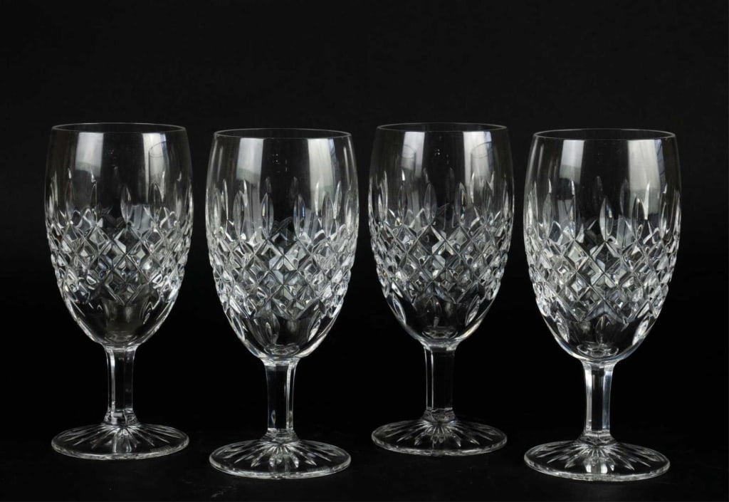 FOUR WATERFORD 'LISMORE' ICED TEA: Four Waterford Lismore iced tea. Note: Each lot in this auction was stored in an active industrial warehouse. Accordingly, lots may exhibit dust and/or surface residue and may benefit from cleaning. A