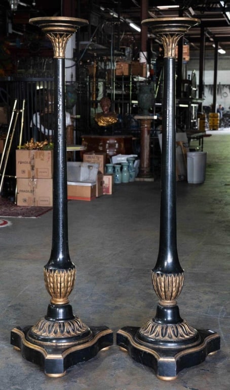 ITALIAN PAIR OF EBONIZED PARCEL GILT PEDESTALS: Pair of large ebonized parcel gilt pedestals. Note: Each lot in this auction was stored in an active industrial warehouse. Accordingly, lots may exhibit dust and/or surface residue and may benefit fro