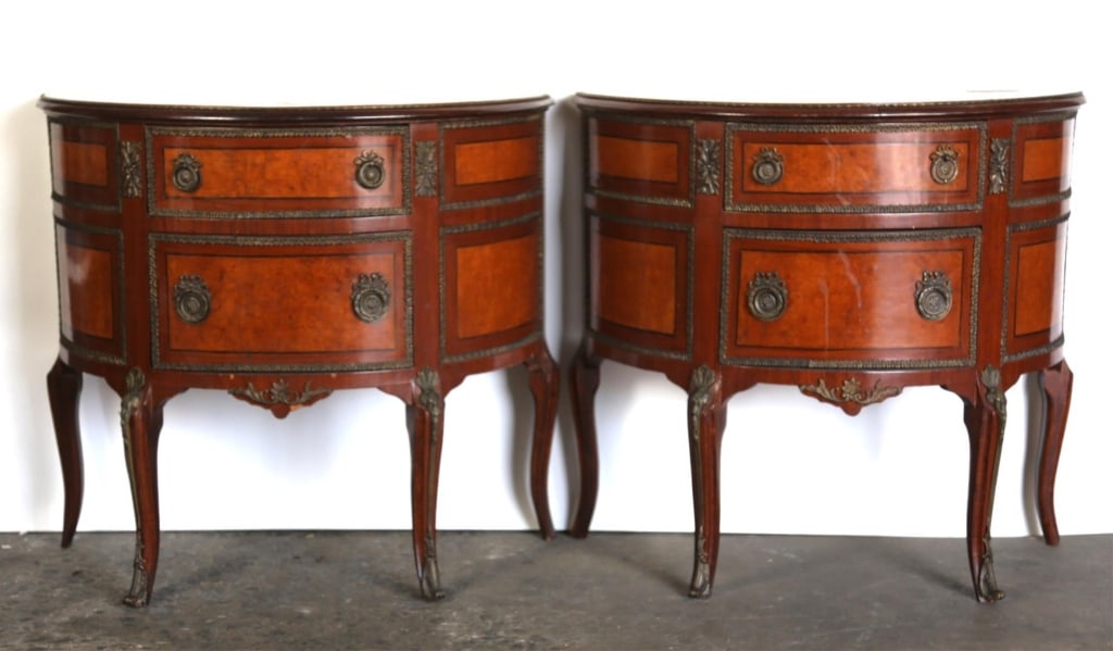 FRENCH PAIR OF DEMILUNE COMMODES: Pair of French demilune side commodes 20th c. Note: Each lot in this auction was stored in an active industrial warehouse. Accordingly, lots may exhibit dust and/or surface residue and may benefit fro