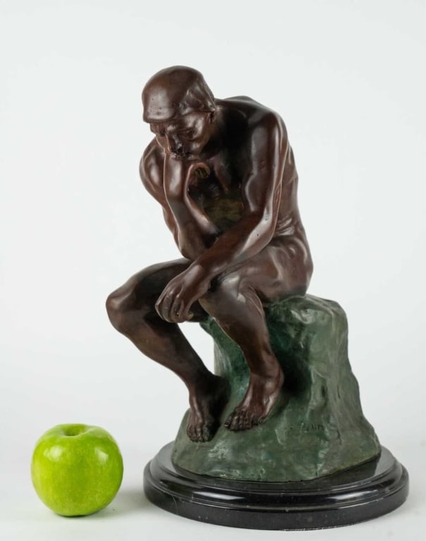 AFTER RODIN BRONZE SCULPTURE OF A SEATED MALE: After Rodin, bronze sculpture of a seated male. Note: Each lot in this auction was stored in an active industrial warehouse. Accordingly, lots may exhibit dust and/or surface residue and may benefit f