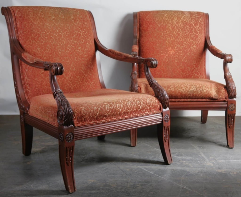ITALIAN HAND CARVED MAHOGANY ARMCHAIRS: Pair of Italian hand carved mahogany modern armchairs. Note: Each lot in this auction was stored in an active industrial warehouse. Accordingly, lots may exhibit dust and/or surface residue and may be