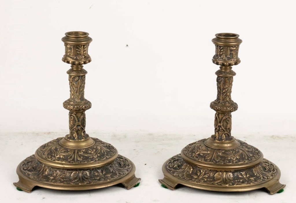 BRONZE RENAISSANCE REVIVAL CANDLE STICKS: Bronze renaissance revival candle sticks. Note: Each lot in this auction was stored in an active industrial warehouse. Accordingly, lots may exhibit dust and/or surface residue and may benefit from cl