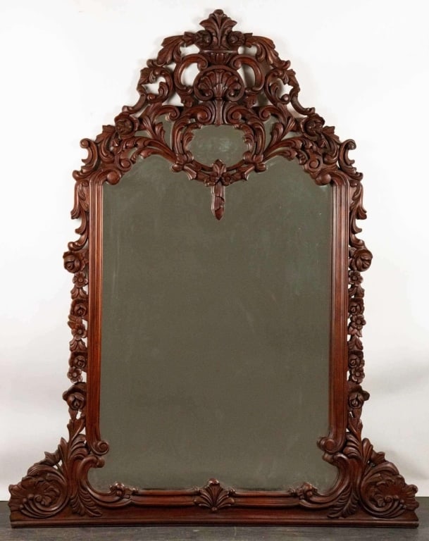 HAND CARVED INDONESIAN MAHOGANY OVERMANTEL MIRROR: Hand carved Indonesian mahogany overmantel mirror. Note: Each lot in this auction was stored in an active industrial warehouse. Accordingly, lots may exhibit dust and/or surface residue and may benefi
