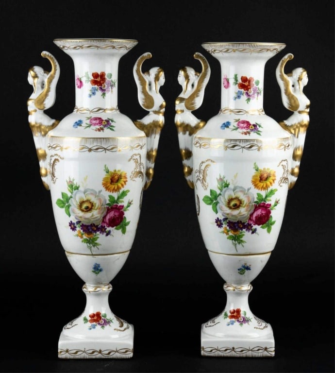 EGYPTIAN REVIVAL FLORAL DECORATED PORCELAIN VASES: Egyptian revival floral decorated porcelain vases. Note: Each lot in this auction was stored in an active industrial warehouse. Accordingly, lots may exhibit dust and/or surface residue and may benefi