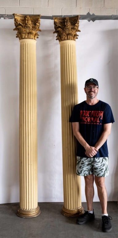 CORINTHIAN COLUMNS PAIR WITH GILT CAPITALS: Pair of fiberglass Corinthian columns with gilt capitals decorative fiberglass 20th c. Note: Each lot in this auction was stored in an active industrial warehouse. Accordingly, lots may exhibit dust a