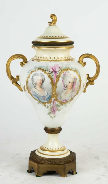 FRENCH ANTIQUE SEVRES STYLE PORCELAIN VASE: Antique Sevres style porcelain vase French, 19th century. Parcel-Gilt, twin handled, hand painted. Note: Each lot in this auction was stored in an active industrial warehouse. Accordingly, lots may ex