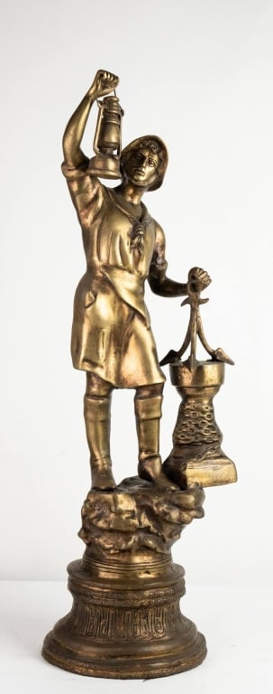 FRENCH SCULPTURE OF A FISHERMAN HOLDING A LANTERN: Frech sculpture of a fisherman holding a lantern. Note: Each lot in this auction was stored in an active industrial warehouse. Accordingly, lots may exhibit dust and/or surface residue and may benefit