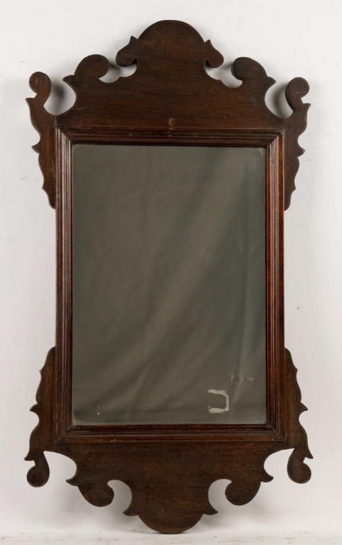 ENGLISH MAHOGANY WALL MIRROR: English Mahogany wall mirror. Note: Each lot in this auction was stored in an active industrial warehouse. Accordingly, lots may exhibit dust and/or surface residue and may benefit from cleaning. Appr
