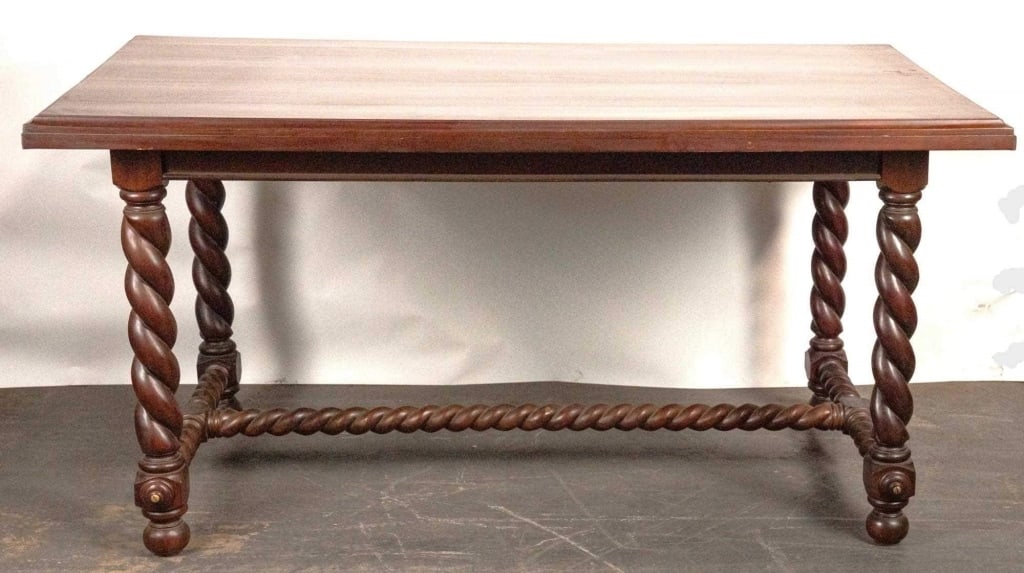 MAHOGANY LIBRARY TABLE WITH BARLEY TWIST LEGS: Mahogany library table with barley twist legs. Note: Each lot in this auction was stored in an active industrial warehouse. Accordingly, lots may exhibit dust and/or surface residue and may benefit fr
