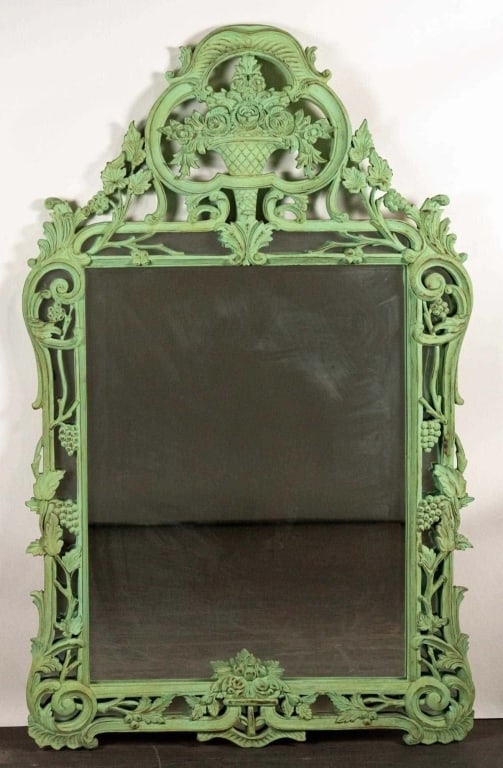 HAND CARVED MAHOGANY VERDIGRIS MIRROR: Hand carved Mahogany verdigris mirror. Note: Each lot in this auction was stored in an active industrial warehouse. Accordingly, lots may exhibit dust and/or surface residue and may benefit from clean