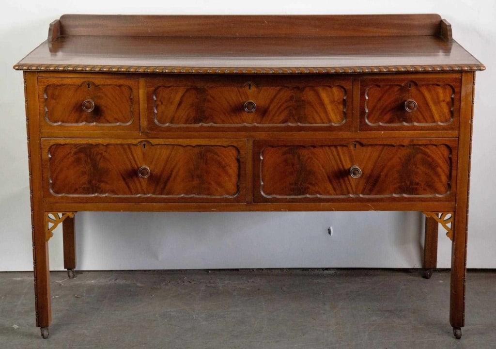 ENGLISH ANTIQUE MAHOGANY CARVED SIDEBOARD: English Mahogany sideboard. Note: Each lot in this auction was stored in an active industrial warehouse. Accordingly, lots may exhibit dust and/or surface residue and may benefit from cleaning. Approx