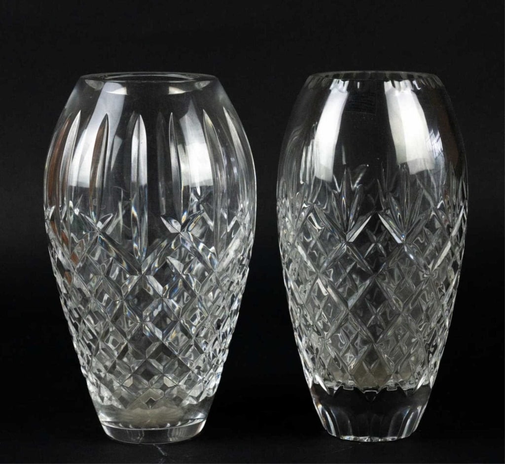 WATERFORD CRYSTAL ROSE VASE PAIRING: Waterford crystal rose vase pairing one in Lismore. Note: Each lot in this auction was stored in an active industrial warehouse. Accordingly, lots may exhibit dust and/or surface residue and may benef