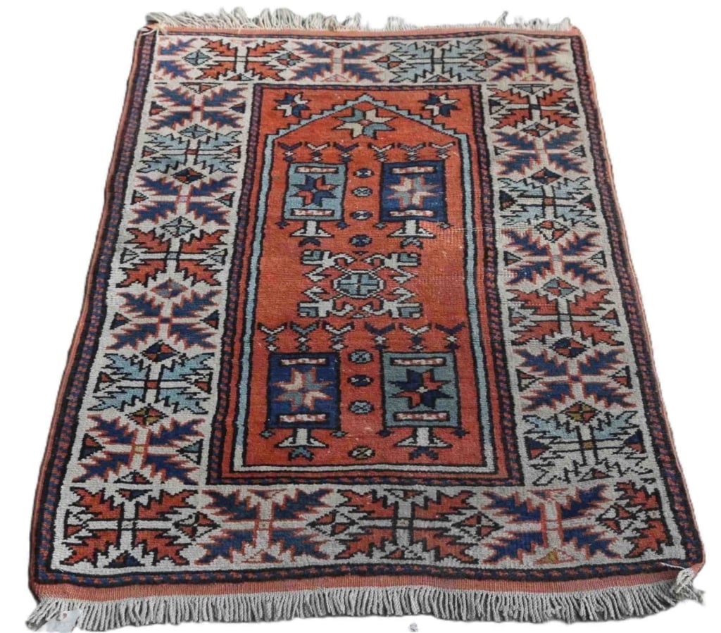KAZAK TURKSIH HAND WOVEN RUG: Hand woven Kazak rug. Note: Each lot in this auction was stored in an active industrial warehouse. Accordingly, lots may exhibit dust and/or surface residue and may benefit from cleaning. Approximate 