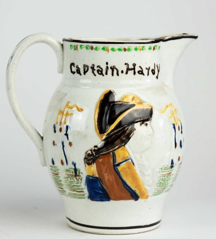 ADMIRAL NELSON 19TH C. PORCELAIN PITCHER: 19th c. Admiral nelson porcelain pitcher. Note: Each lot in this auction was stored in an active industrial warehouse. Accordingly, lots may exhibit dust and/or surface residue and may benefit from cl