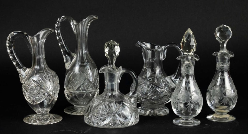 AMERICAN ANTIQUE OF 6 CUT GLASS CRUET BOTTLES: American antique of 6 cut glass cruet bottles of them have stoppers. Note: Each lot in this auction was stored in an active industrial warehouse. Accordingly, lots may exhibit dust and/or surface resi