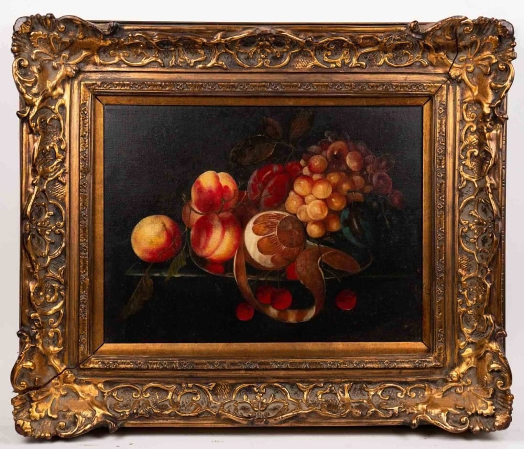CONTINENTAL SCHOOL FRUIT STILL LIFE OIL ON CANVAS: 20th century Continental school opulent fruit arrangement with peaches grapes cherries and a gourd on a ledge against a dark ground oil on canvas apparently unsigned presented in an ornate gilt compos