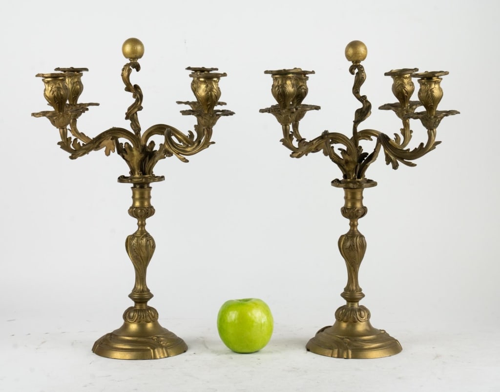 DECORATIVE 4-ARM BRASS CANDELABRAS: Decorative 4-arm brass candelabras. Note: Each lot in this auction was stored in an active industrial warehouse. Accordingly, lots may exhibit dust and/or surface residue and may benefit from cleaning