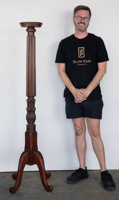 AMERICAN ANTIQUE MAHOGANY FLUTED FERN PLANT STAND: American antique Mahogany fluted fern plant stand. Note: Each lot in this auction was stored in an active industrial warehouse. Accordingly, lots may exhibit dust and/or surface residue and may benefi