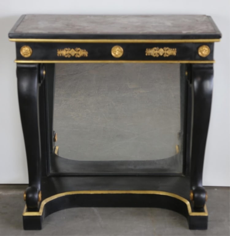 EMPIRE EBONIZED PARCEL-GILT MARBLE TOP CONSOLE: Ebonized parcel-Gilt marble top console. Note: Each lot in this auction was stored in an active industrial warehouse. Accordingly, lots may exhibit dust and/or surface residue and may benefit from cle