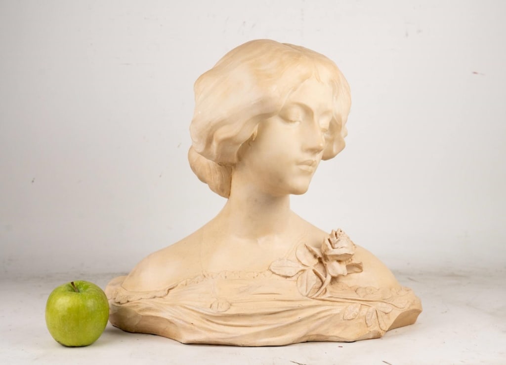 AMERICAN ANTIQUE ALABASTER BUST OF A WOMAN: American antique alabaster bust of a woman. Note: Each lot in this auction was stored in an active industrial warehouse. Accordingly, lots may exhibit dust and/or surface residue and may benefit from