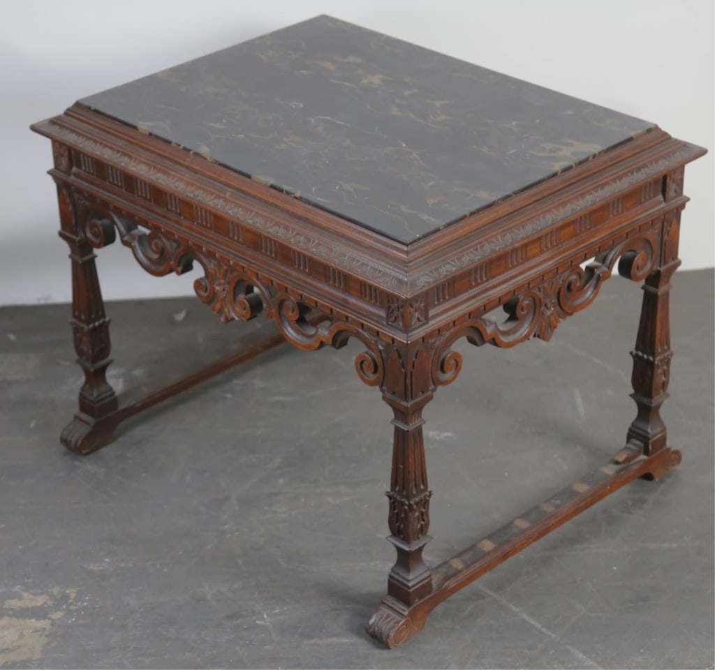 AMERICAN CARVED INSET MARBLE TOP SIDE TABLE: American carved inset marble top side table. Note: Each lot in this auction was stored in an active industrial warehouse. Accordingly, lots may exhibit dust and/or surface residue and may benefit from