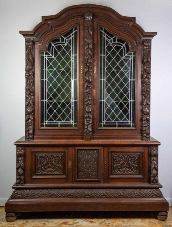 19TH C. FRENCH HAND-CARVED STAINED GLASS VITRINE C: French, 19th century. Hand-carved stained glass vitrine cabinet with carved central applications, floral and fruit carvings, and forest green and cobalt stained glass. Approximate dimensions: h. 82.5"