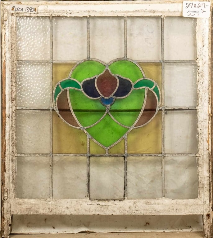 FRENCH ART NOUVEAU STAINED GLASS PANEL: French Art Nouveau stained glass panel with a heart-shaped floral medallion. Approximate dimensions: h. 27", w. 27" Disclaimer: This is an online court ordered bankruptcy sale. Participating bidders m
