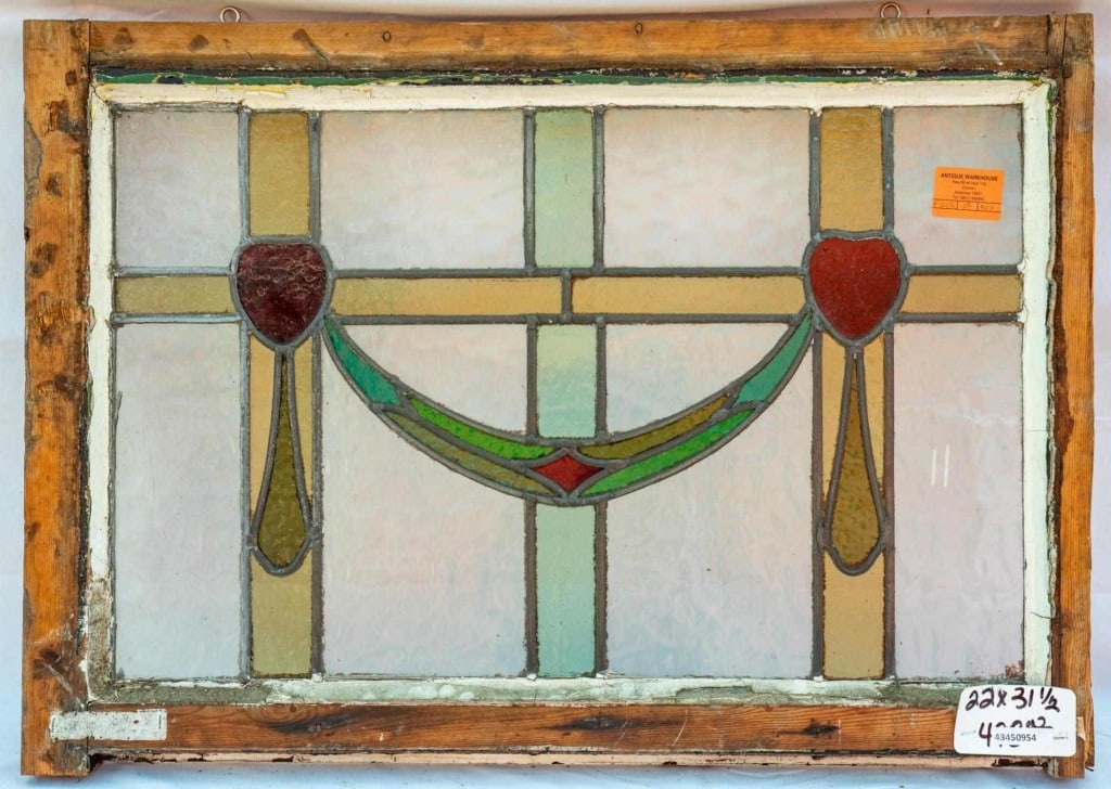 FRENCH ART NOUVEAU STAINED GLASS PANEL: French Art Nouveau stained glass panel with floral and ribbon motif. Approximate dimensions: h. 22", w. 31.5" Disclaimer: This is an online court ordered bankruptcy sale. Participating bidders must ha