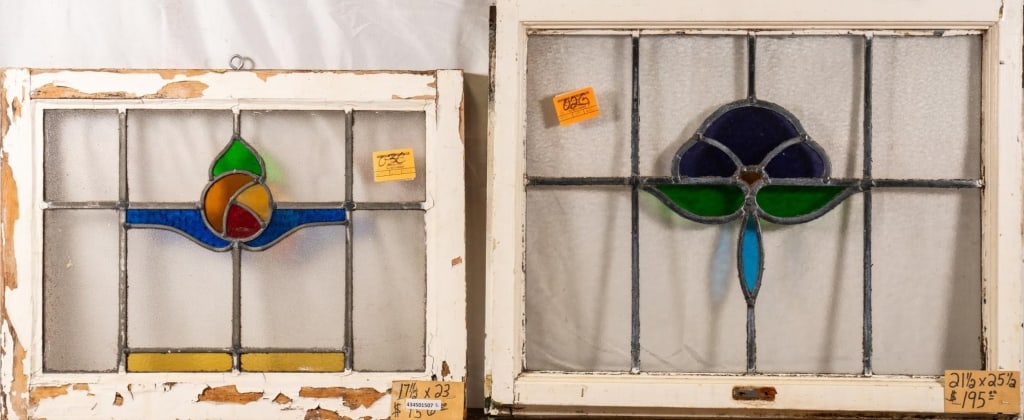 TWO CONTINENTAL ART NOUVEAU STAINED GLASS PANELS: Two Continental Art Nouveau stained glass panels with a floral motif. Approximate dimensions: h. 21.5", w. 25.5" Disclaimer: This is an online court ordered bankruptcy sale. Participating bidders must