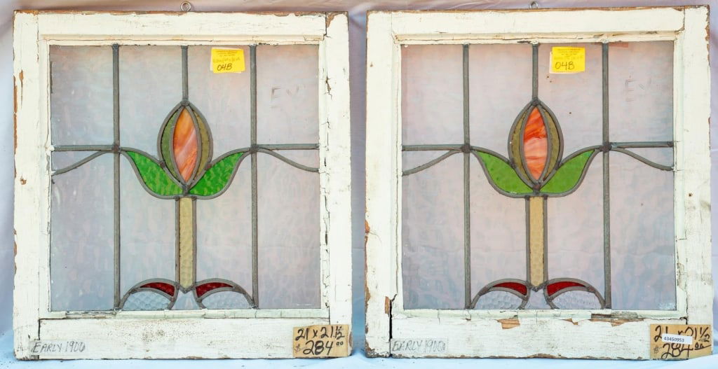 PAIR OF FRENCH ART NOUVEAU STAINED GLASS PANELS: Pair of French Art Nouveau stained glass panels with a floral motif. Approximate dimensions: h. 21.5", w. 21" Disclaimer: This is an online court ordered bankruptcy sale. Participating bidders must ha