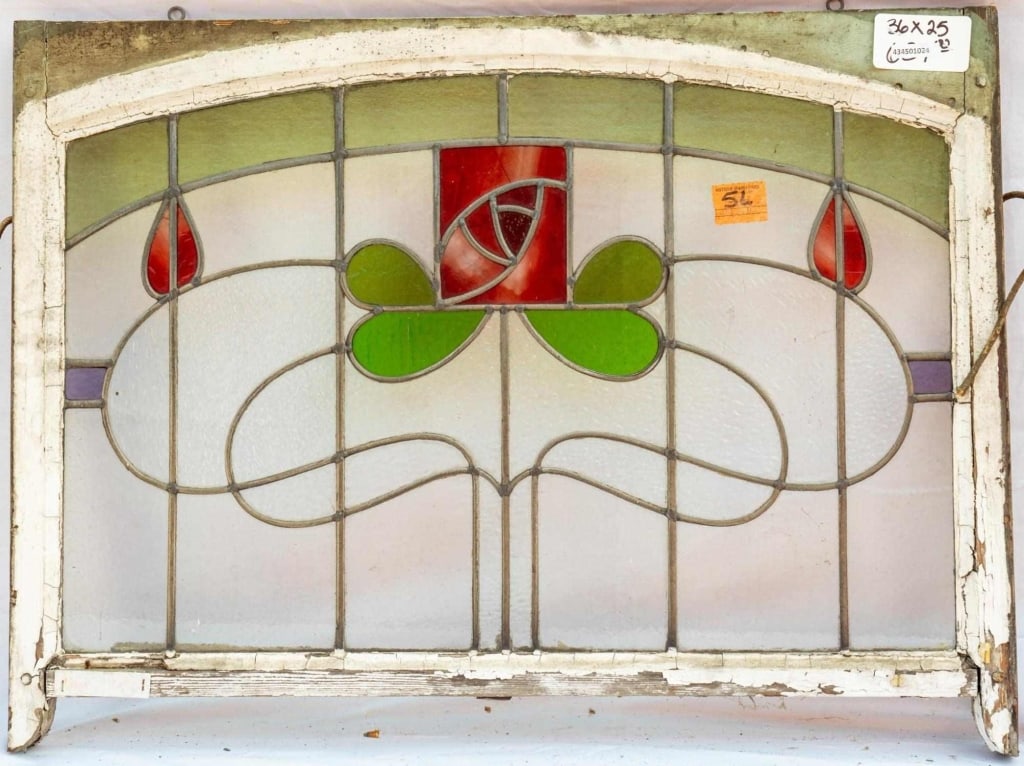 FRENCH ART NOUVEAU STAINED GLASS PANEL: French Art Nouveau stained glass panel with rose and clover medallion. Approximate dimensions: h. 25", w. 36" Disclaimer: This is an online court ordered bankruptcy sale. Participating bidders must ha