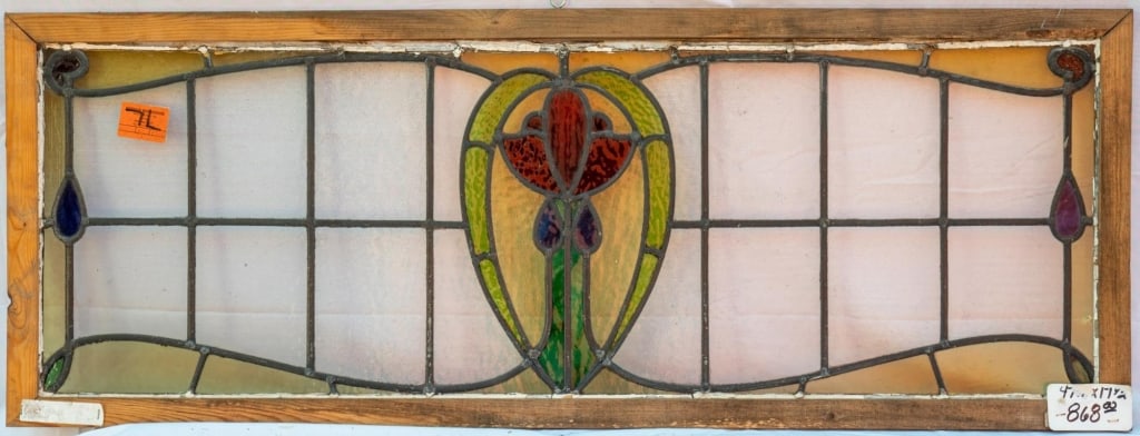 FRENCH ART NOUVEAU STAINED GLASS PANEL: French Art Nouveau stained glass panel with a red rose motif in stained glass, accented with purple and chartreuse details. Approximate dimensions: h. 17.5", w. 47" Disclaimer: This is an online court