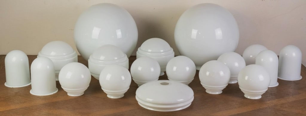 18 VINTAGE MILK GLASS LAMP GLOBES: Eighteen vintage milk glass lamp globes. Approximate dimensions: Disclaimer: This is an online court ordered bankruptcy sale. Participating bidders must have a credit card on file with Live Auctioneer