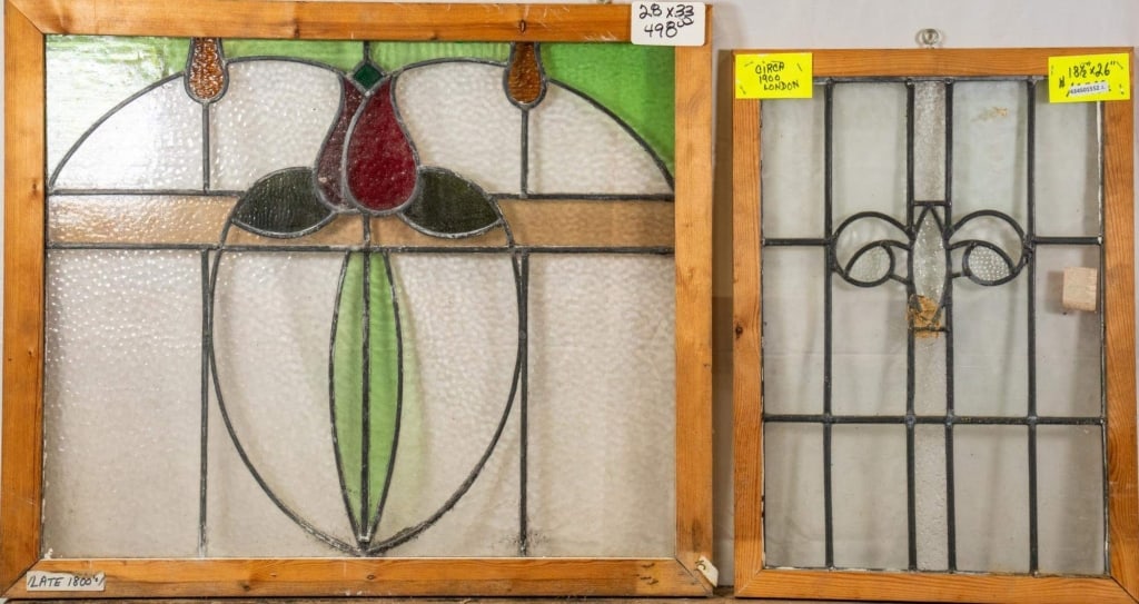 TWO FRENCH ART NOUVEAU GLASS PANELS: Two French Art Nouveau glass panels, one stained glass with a floral medallion, the other textured colorless leaded glass. Approximate dimensions: h. 28", w. 33" Disclaimer: This is an online court or