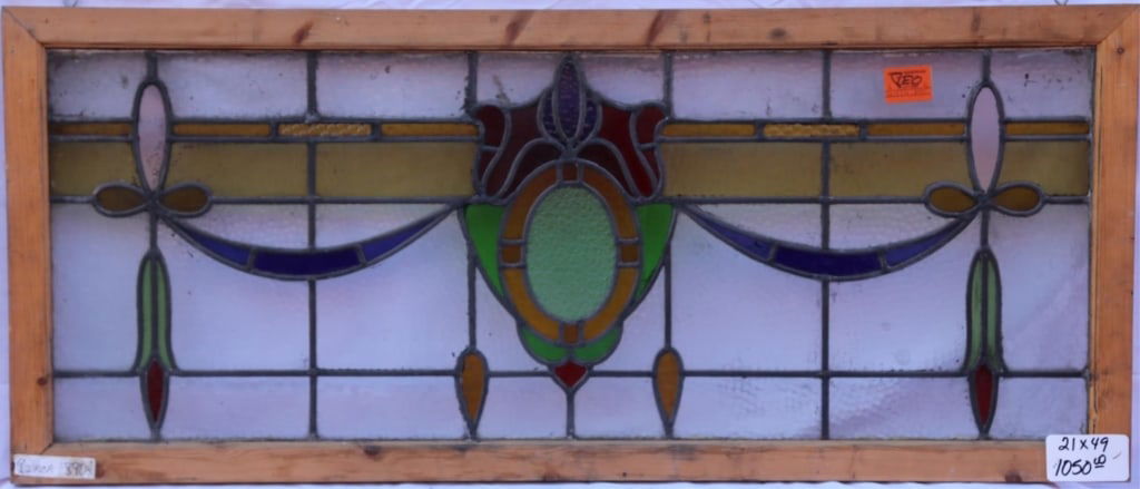 ANTIQUE STAINED GLASS WINDOW: Antique stained glass window. Approximate dimensions: h. 21", w. 49" Disclaimer: This is an online court ordered bankruptcy sale. Participating bidders must have a credit card on file with Live Auctio